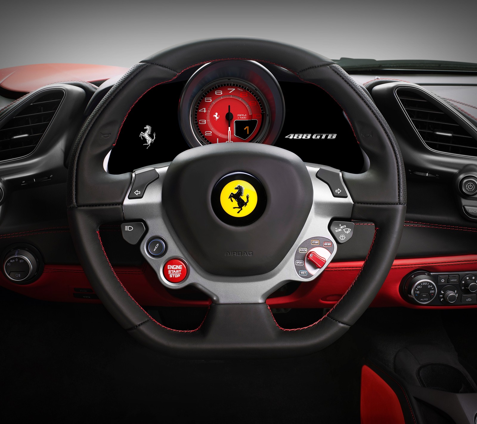 Ferrari steering wheel with red and black trims and a red gauge (auto, car, ferrari, interior, wheel)