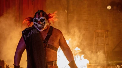 Diente Dulce: El Payaso de Metal Retorcido Emergiendo Entre Llamas