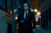 Actor in Formal Suit Walking Through Urban Nightscape