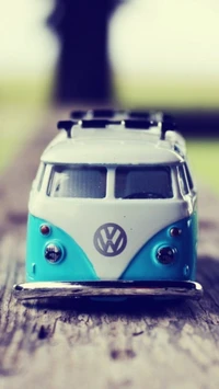 Vintage Volkswagen Bus Toy on a Wooden Surface