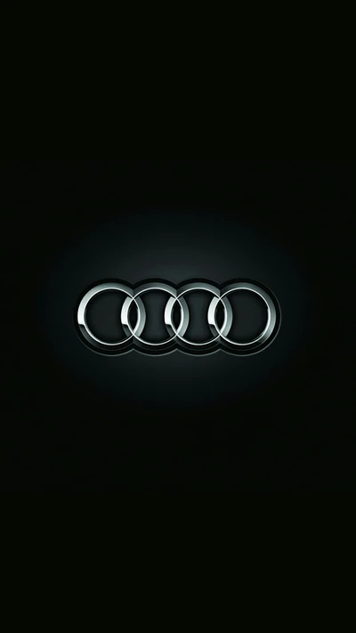 Logo de Audi: Cuatro anillos entrelazados sobre un fondo oscuro