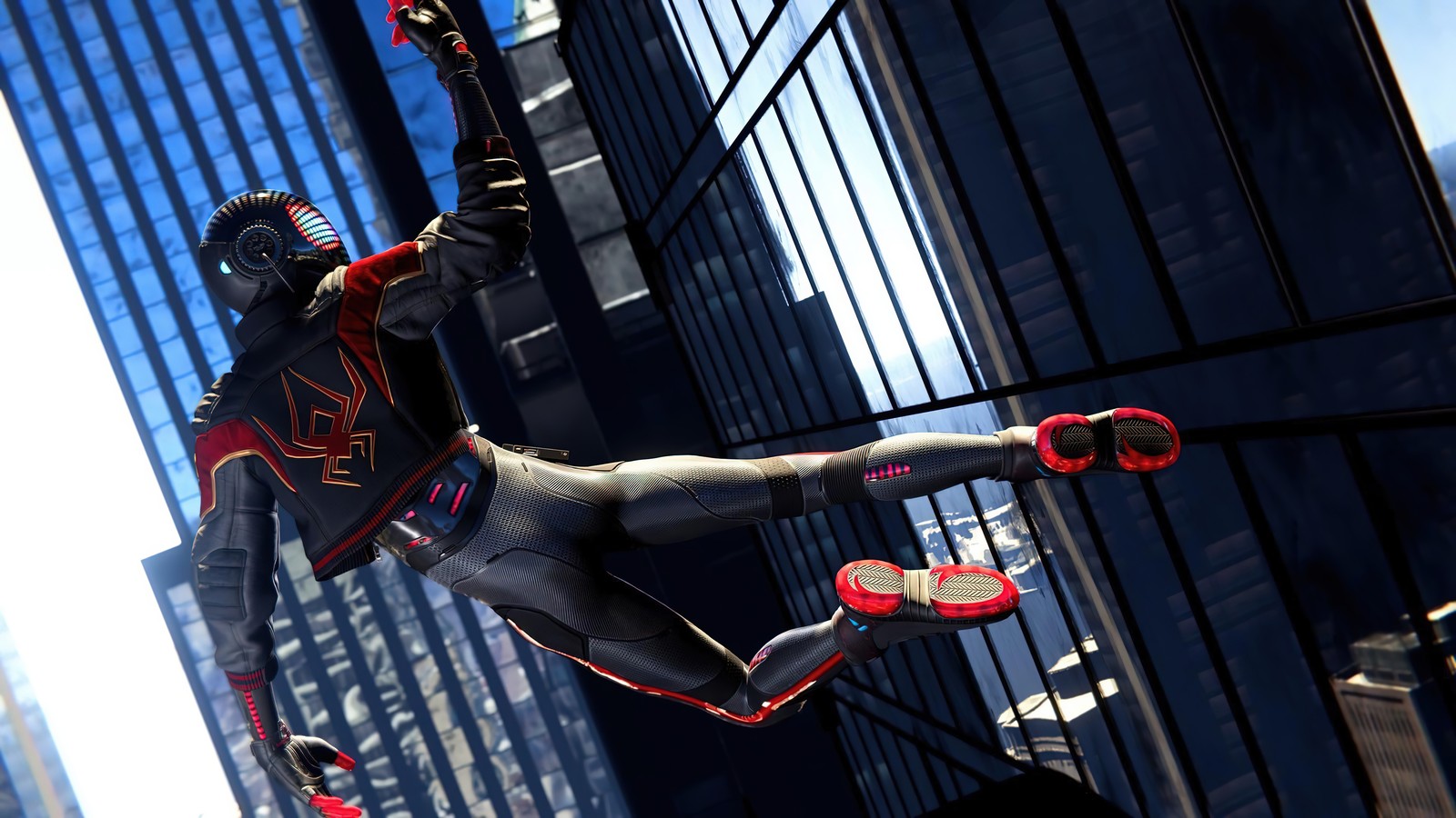 Homme araignée en costume vole dans les airs (marvels spider man miles morales, playstation 5, ps5, ps4, jeu vidéo)