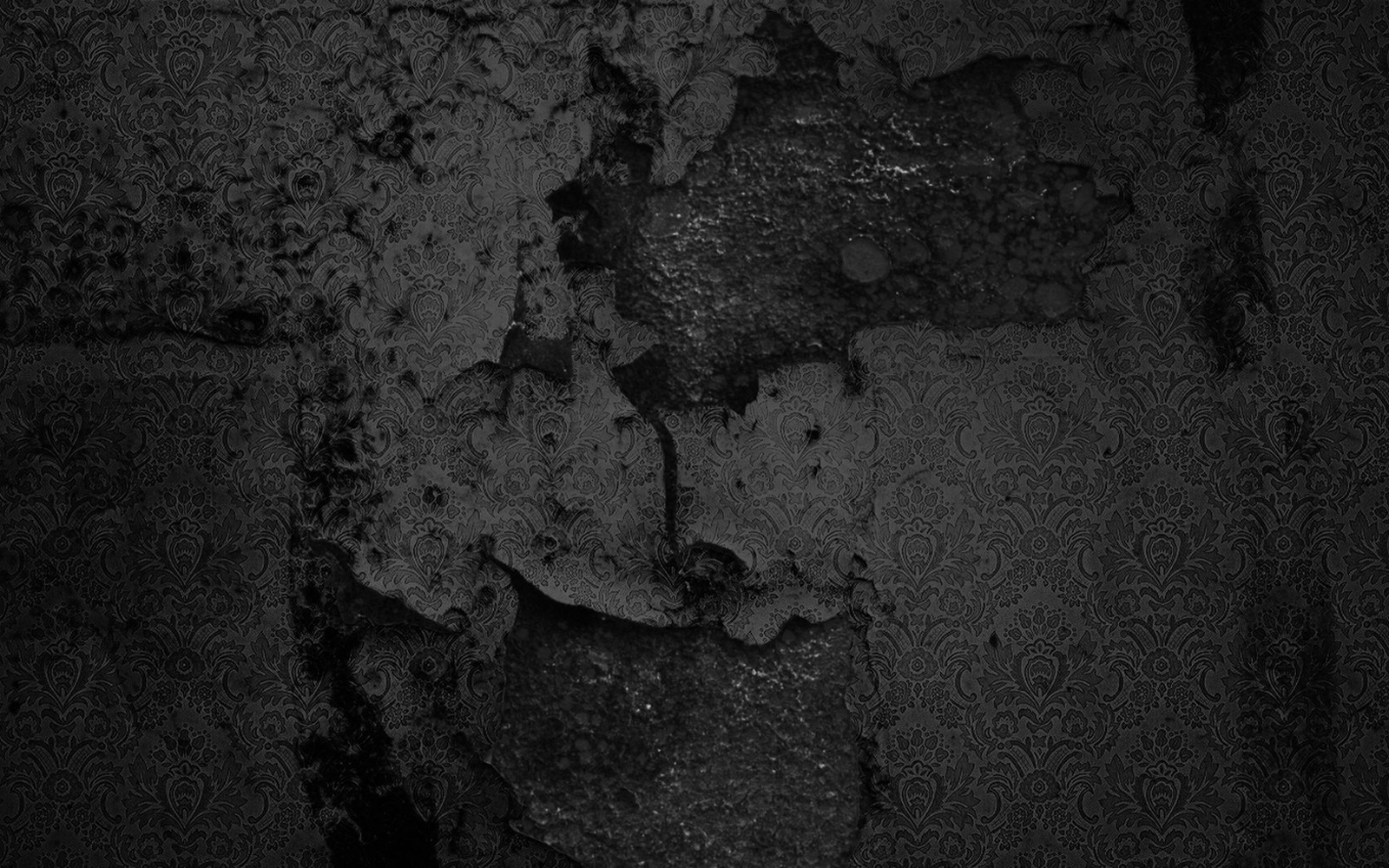 A close up of a black and white photo of a wall (texture, black, wall, monochrome, rock)