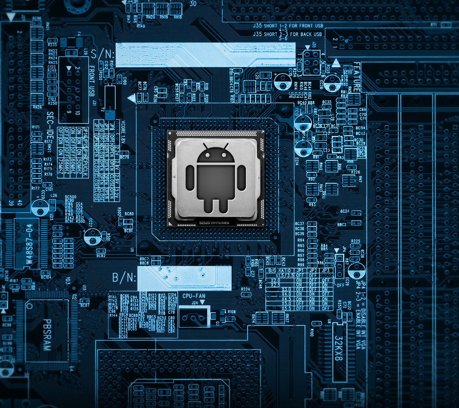 Un primer plano de una placa base de computadora con un microchip en ella (android, cpu)