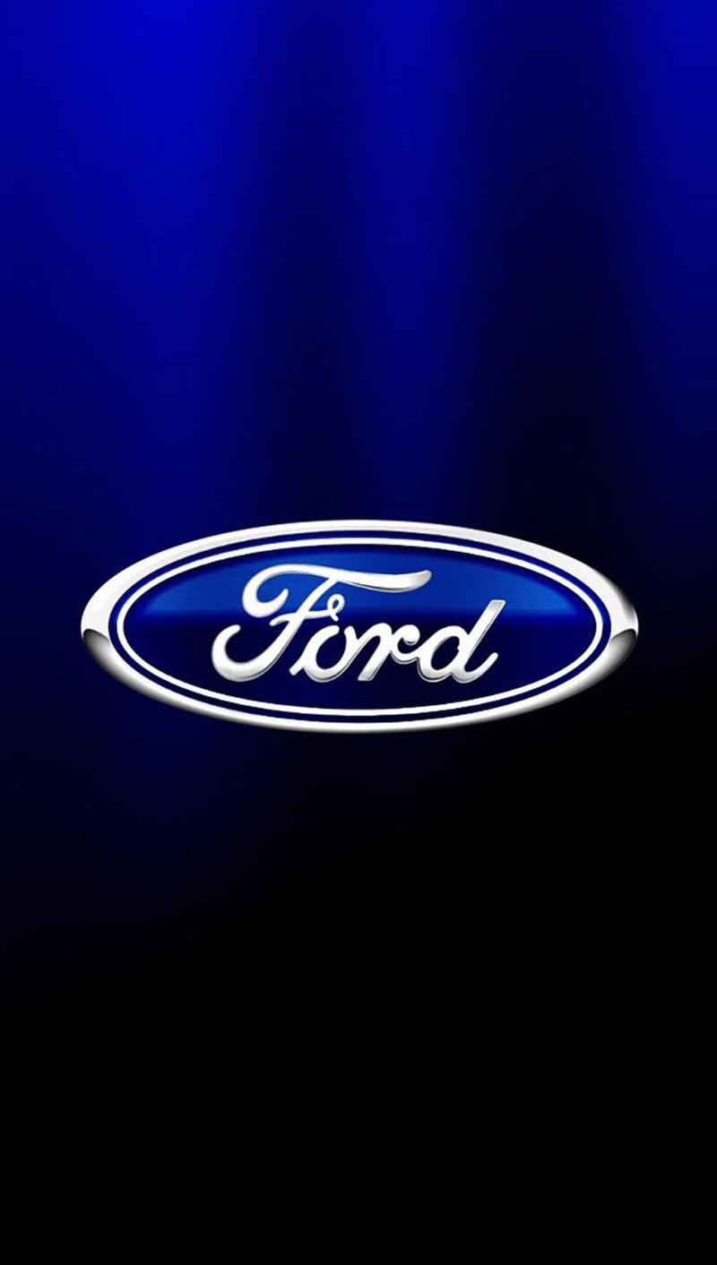 Un gros plan d'un logo ford bleu sur fond noir (fwreg, rgez)