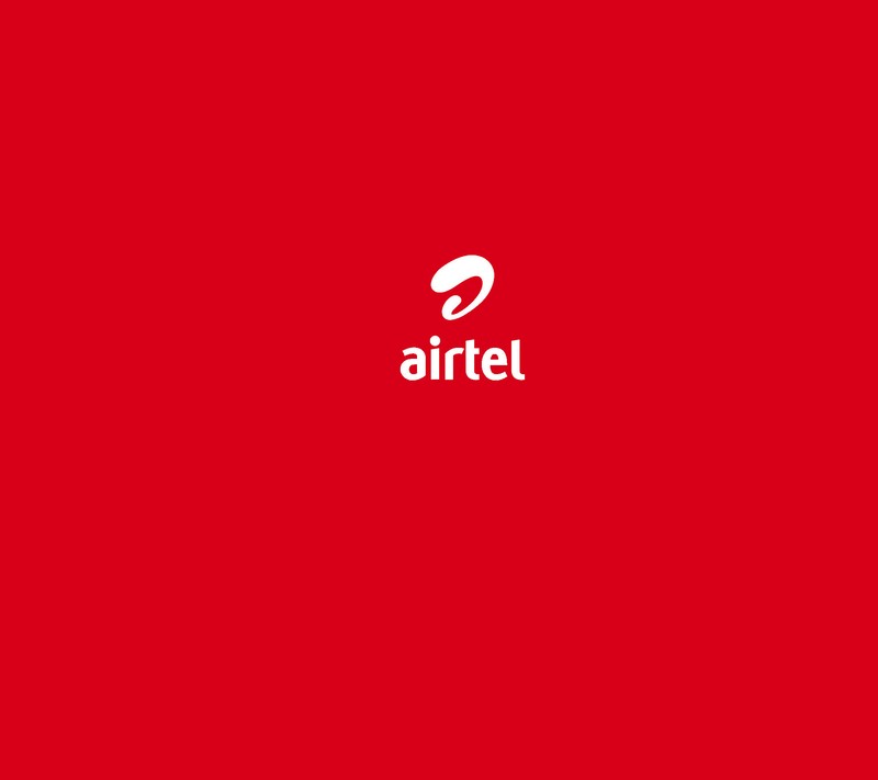 Красный фон с белым логотипом airtel на нем (airtel, логотип, white airtel)