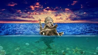 Tranquil Ganesha Amidst a Blue Ocean Sunset