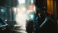 V dans une ruelle cyberpunk éclairée au néon