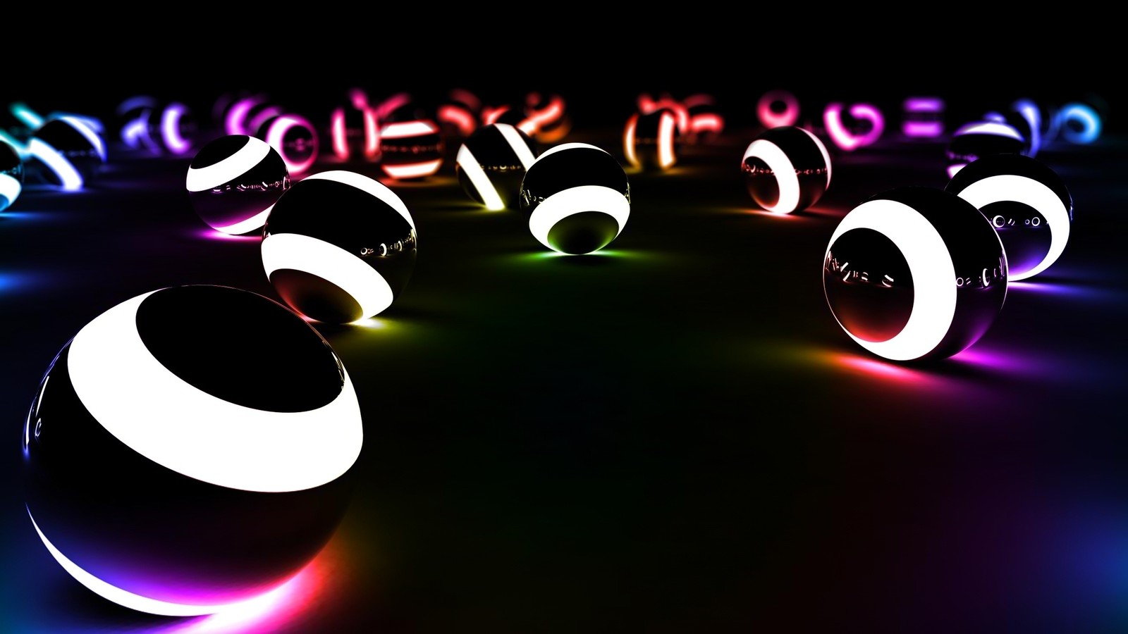 A group of glowing spheres with numbers on them in a dark room (light, billiard ball, pool, ball, bowling ball)