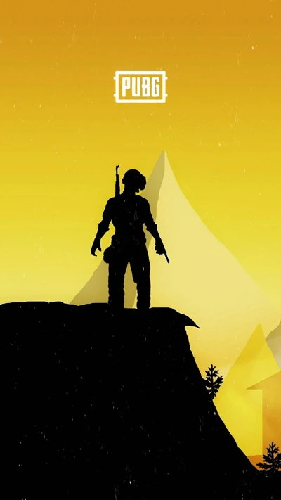 Silhouette de jugador de PUBG en una cresta montañosa al atardecer