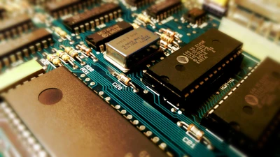 Close-up of a complex electronic motherboard showcasing integrated circuits and microcontrollers.