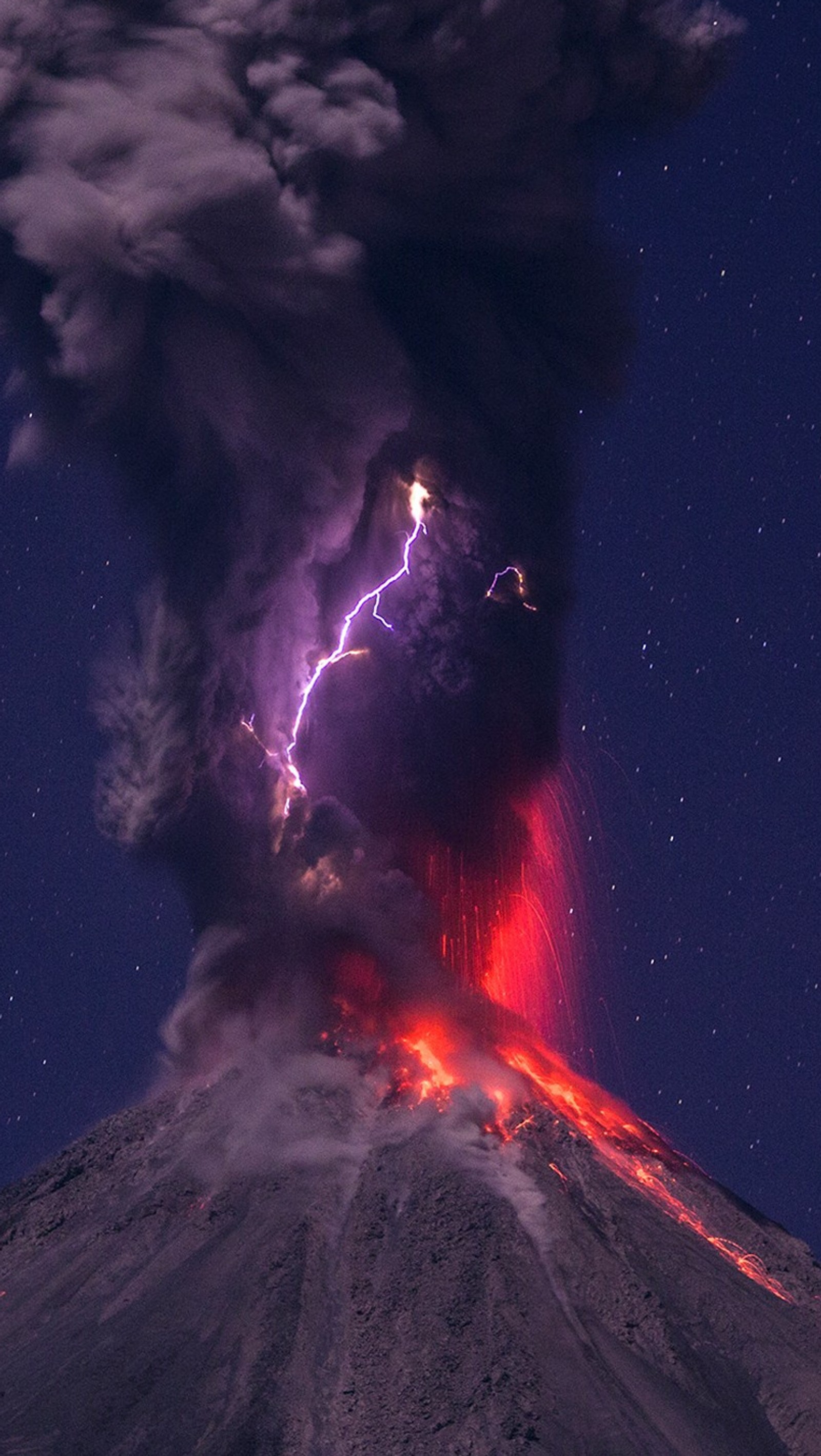 Arafed volcano with a lightning bolt coming out of it (ashes, black, lava, night, red)