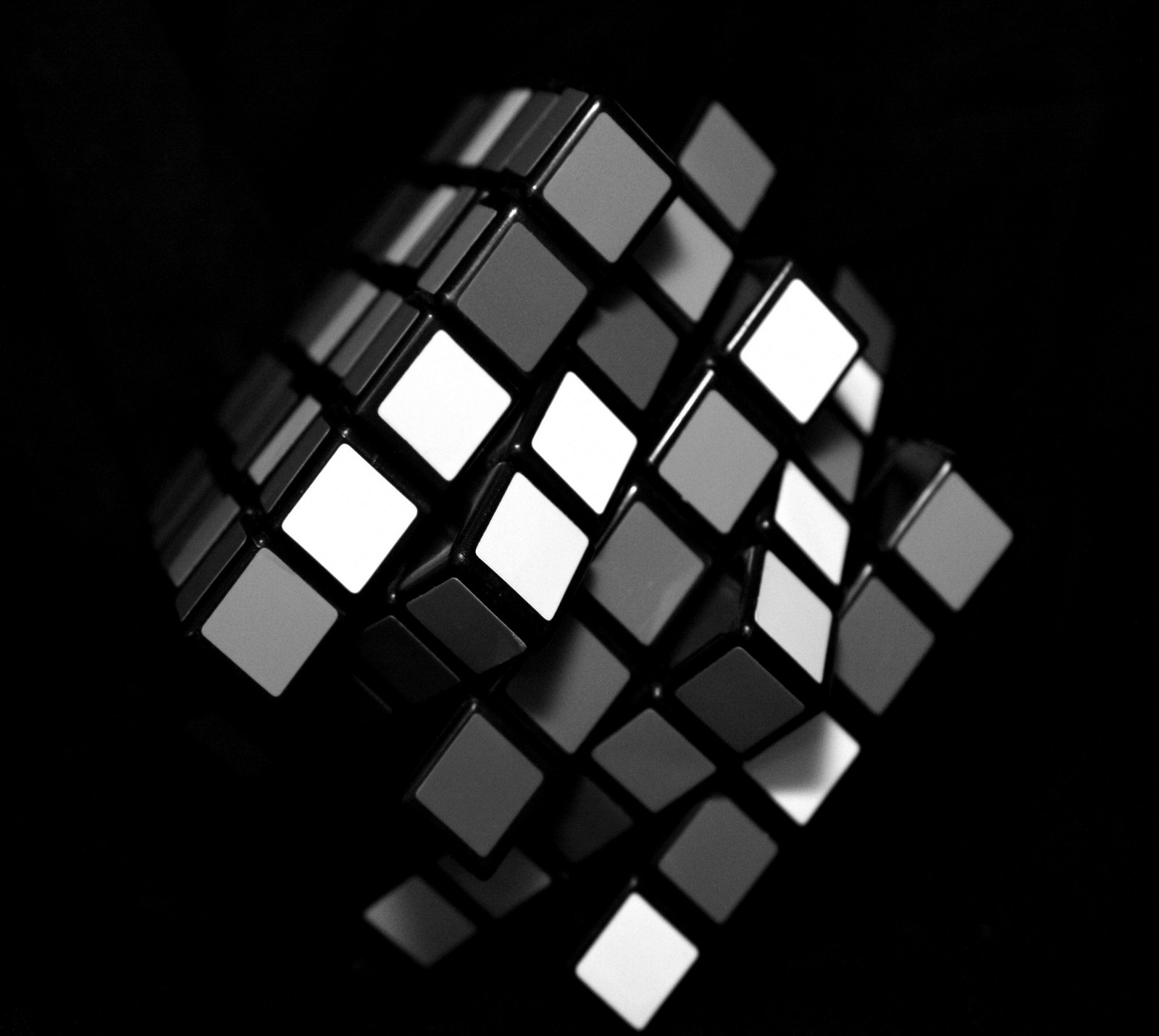 A close up of a rubik cube with a black background (abej, beograd, rubiks cube)