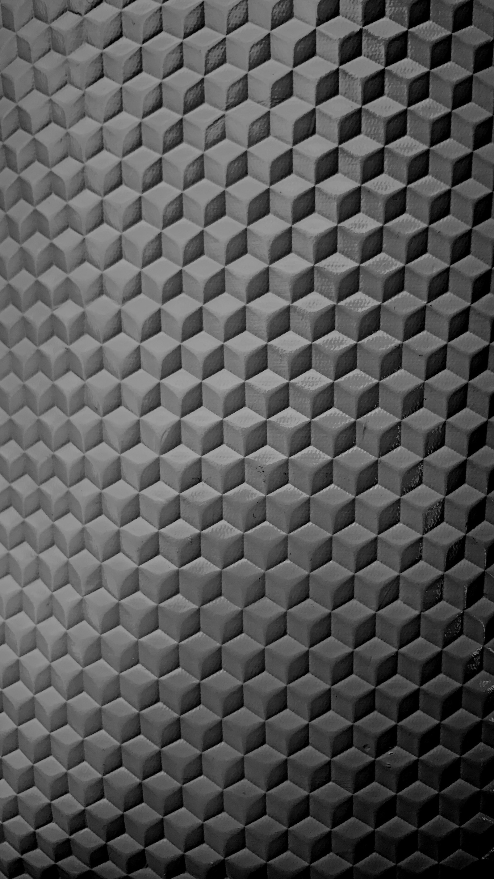 A close up of a black and white photo of a wall (3d, abstract, cool, cube, fabric)