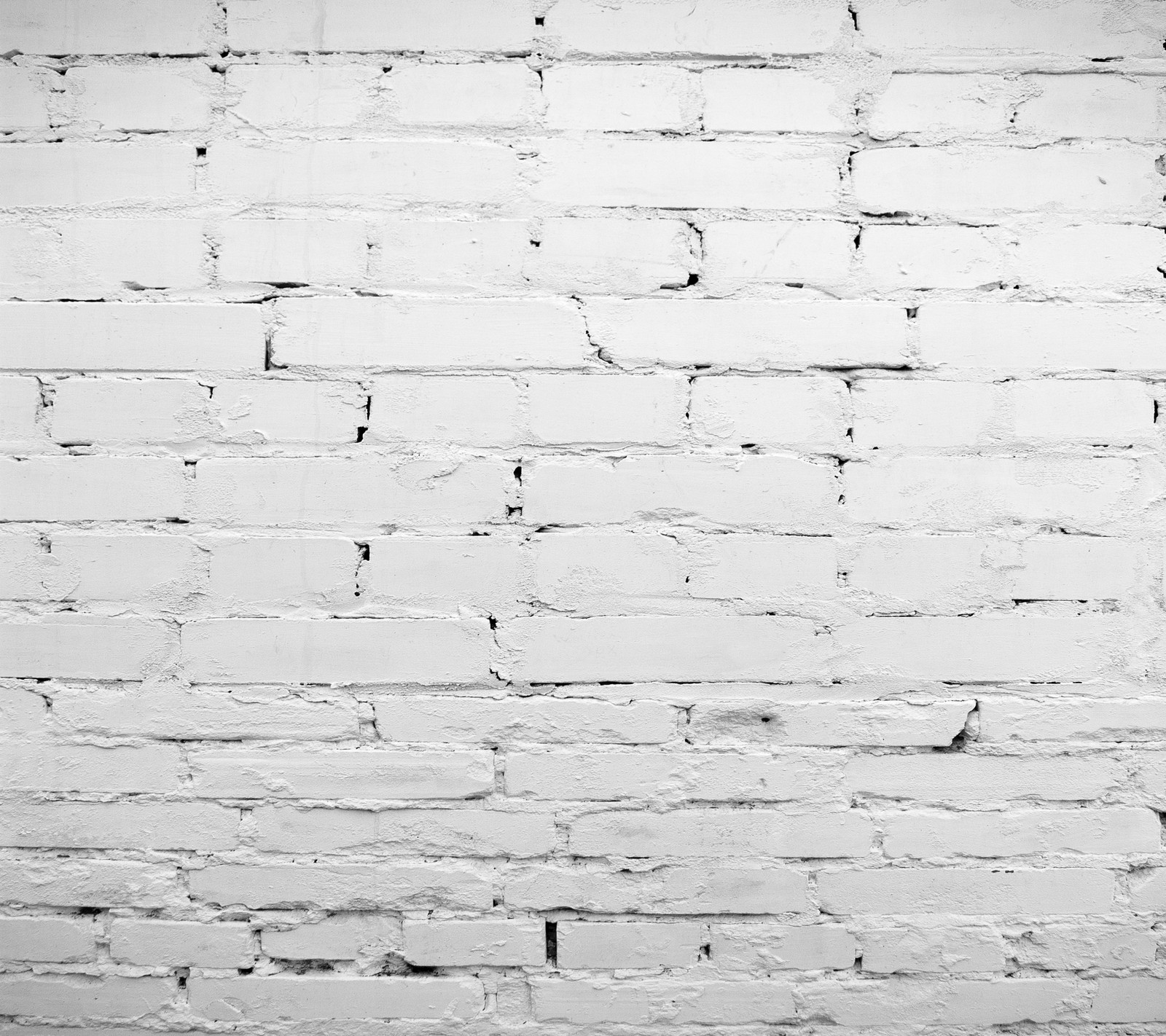 A close up of a white brick wall with a black and white clock (abstract, bricks, texture, wall, white)