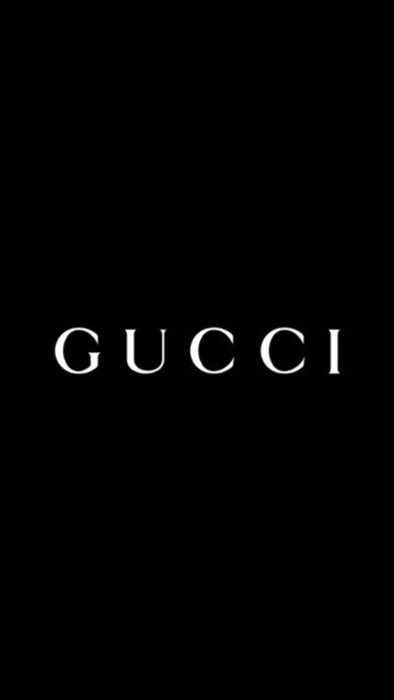 Черный фон с надписью gucci, написанной белым (гг, gg)