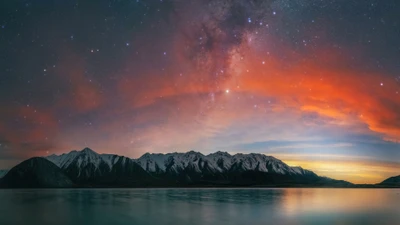 Impresionante atardecer en Nueva Zelanda con cielo estrellado y montañas cubiertas de nieve