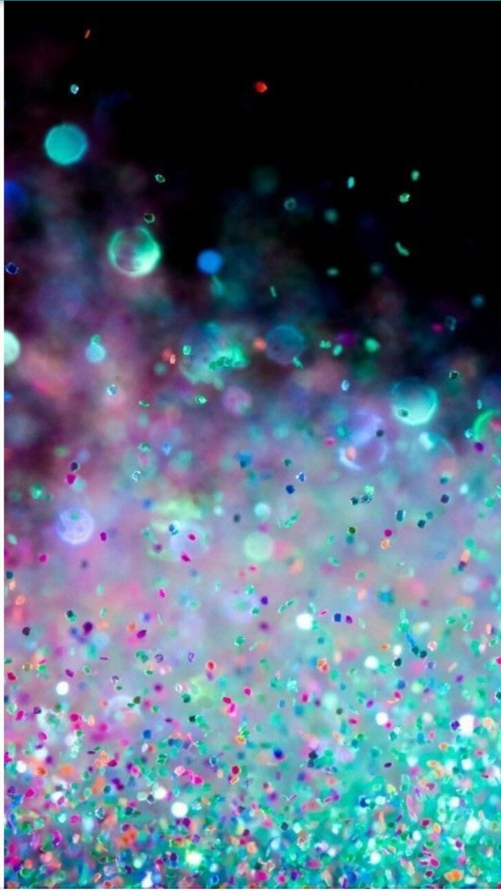 A close up of a glitter covered surface with a black background (glitter, purple, black, red)