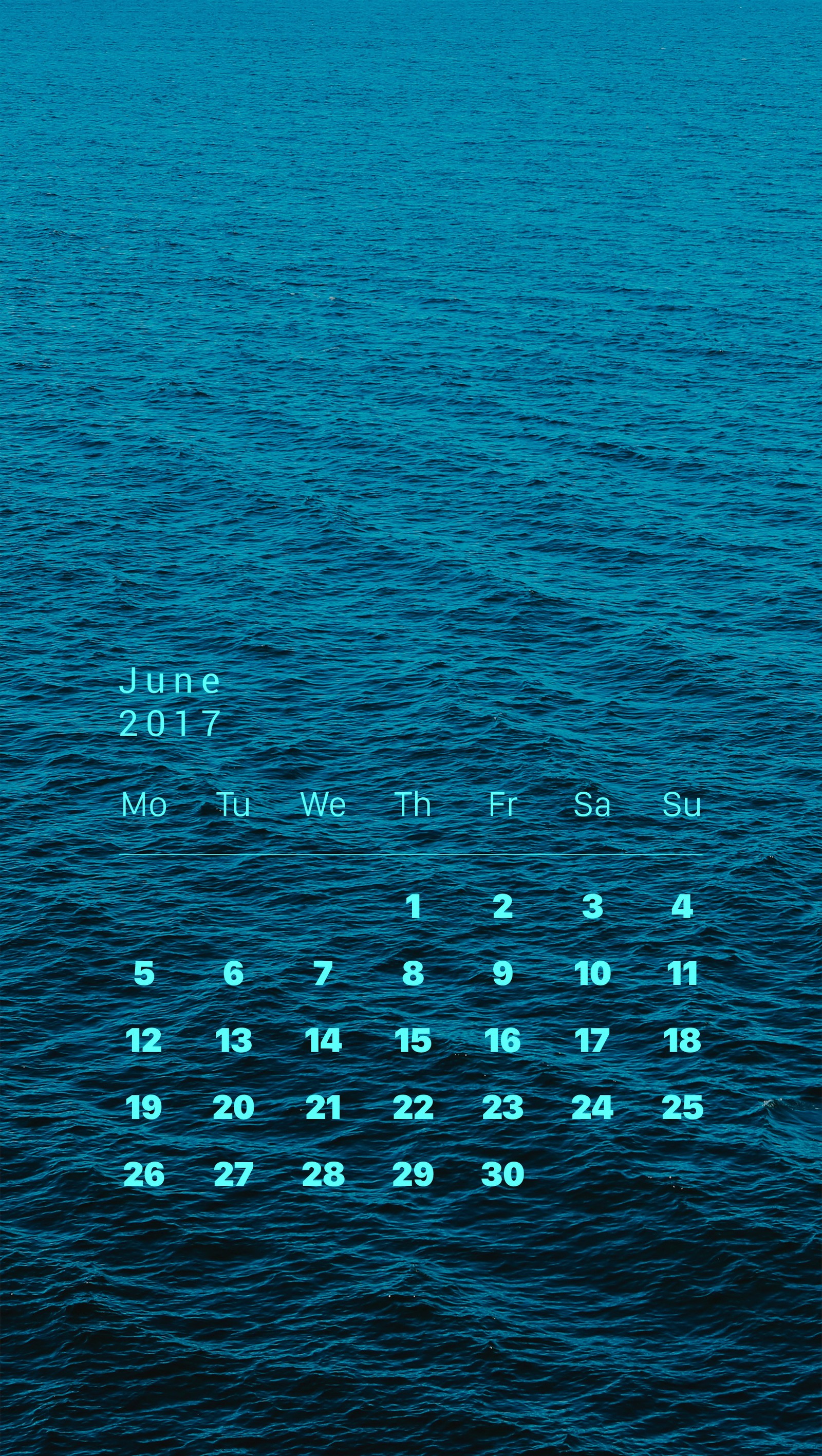 A close up of a calendar on a wall with a blue ocean in the background (blue, calendar, june, lockscreen, waves)