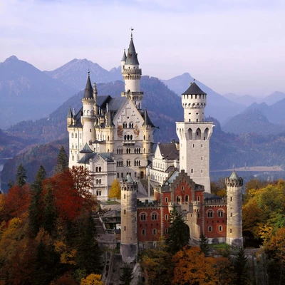 Bavarian Castle Surrounded by Autumn Foliage and Mountains