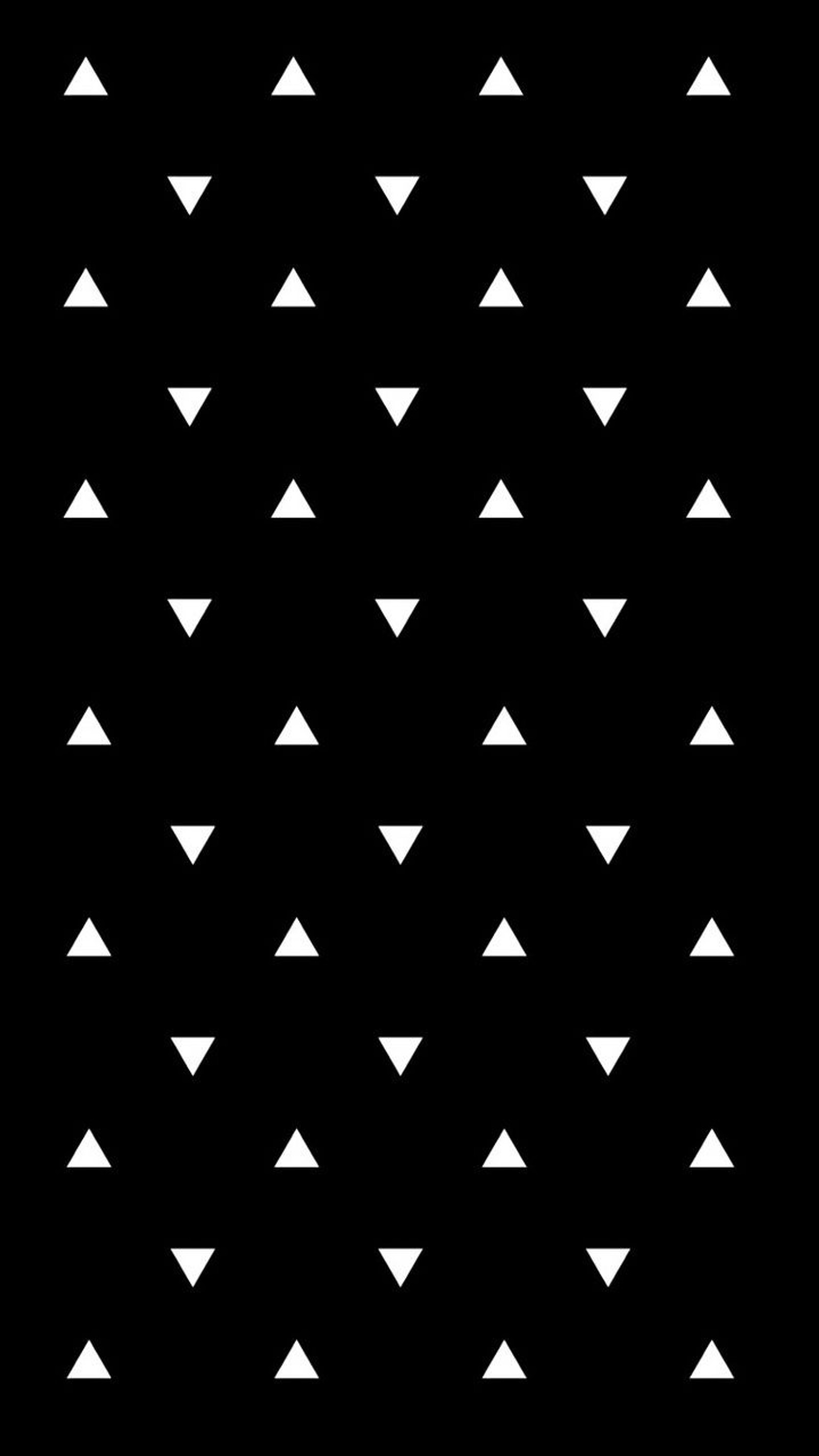 A close up of a black and white pattern with white triangles (basic, black, black and white, monochrome, simple)