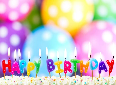 Colorful Birthday Cake with Candles and Festive Background