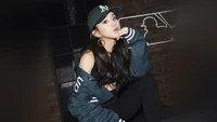 Chaeyoung in a Stylish Streetwear Look with a Cap and Bold Accessories