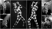 Dynamic monochrome performance of a legendary rock musician in a striking harlequin costume, capturing the essence of pop music and creative arts on stage.