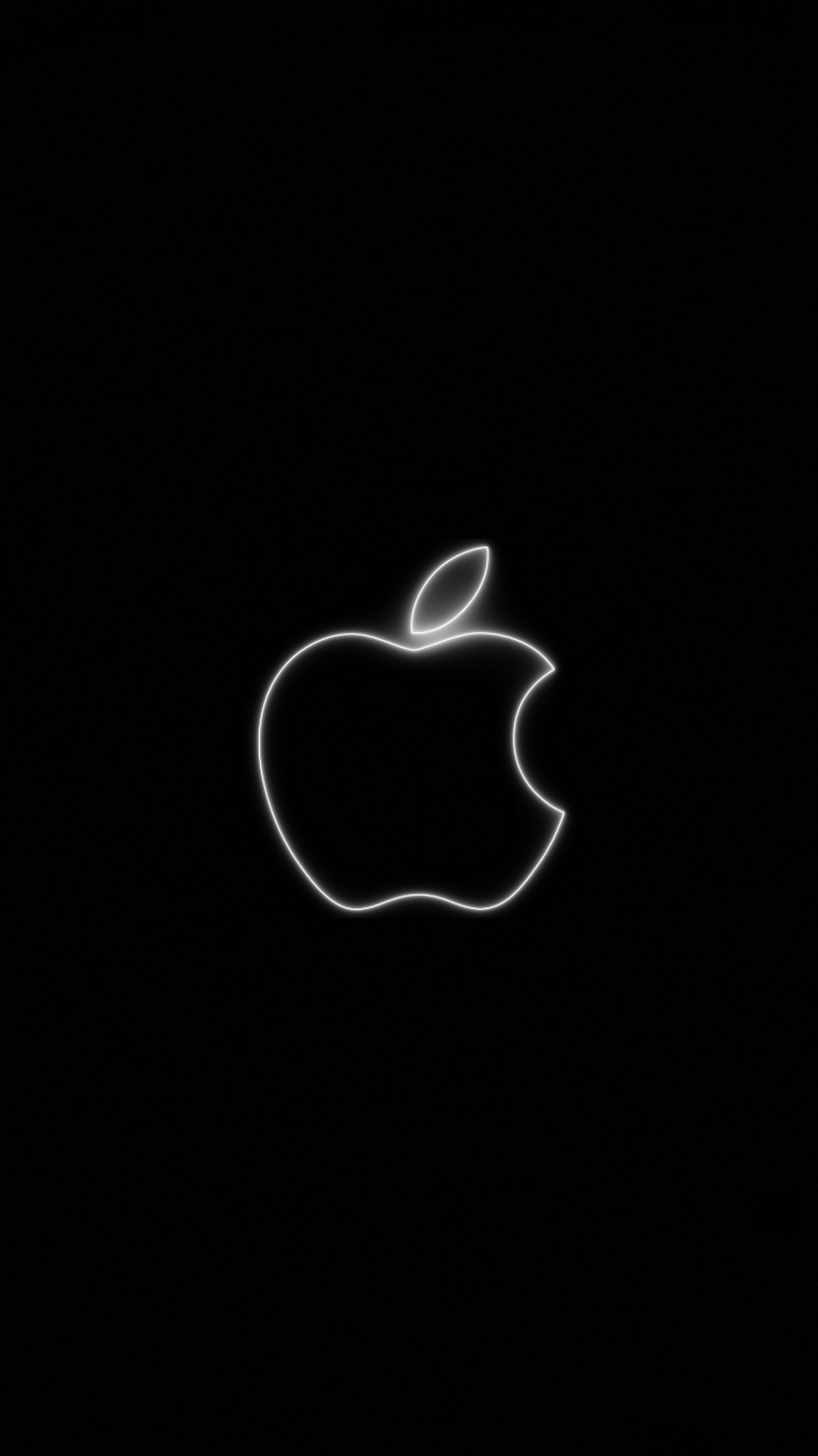 Un primer plano de un fondo negro con el logotipo de apple en blanco (manzana, maca, neón, blanco, negro)