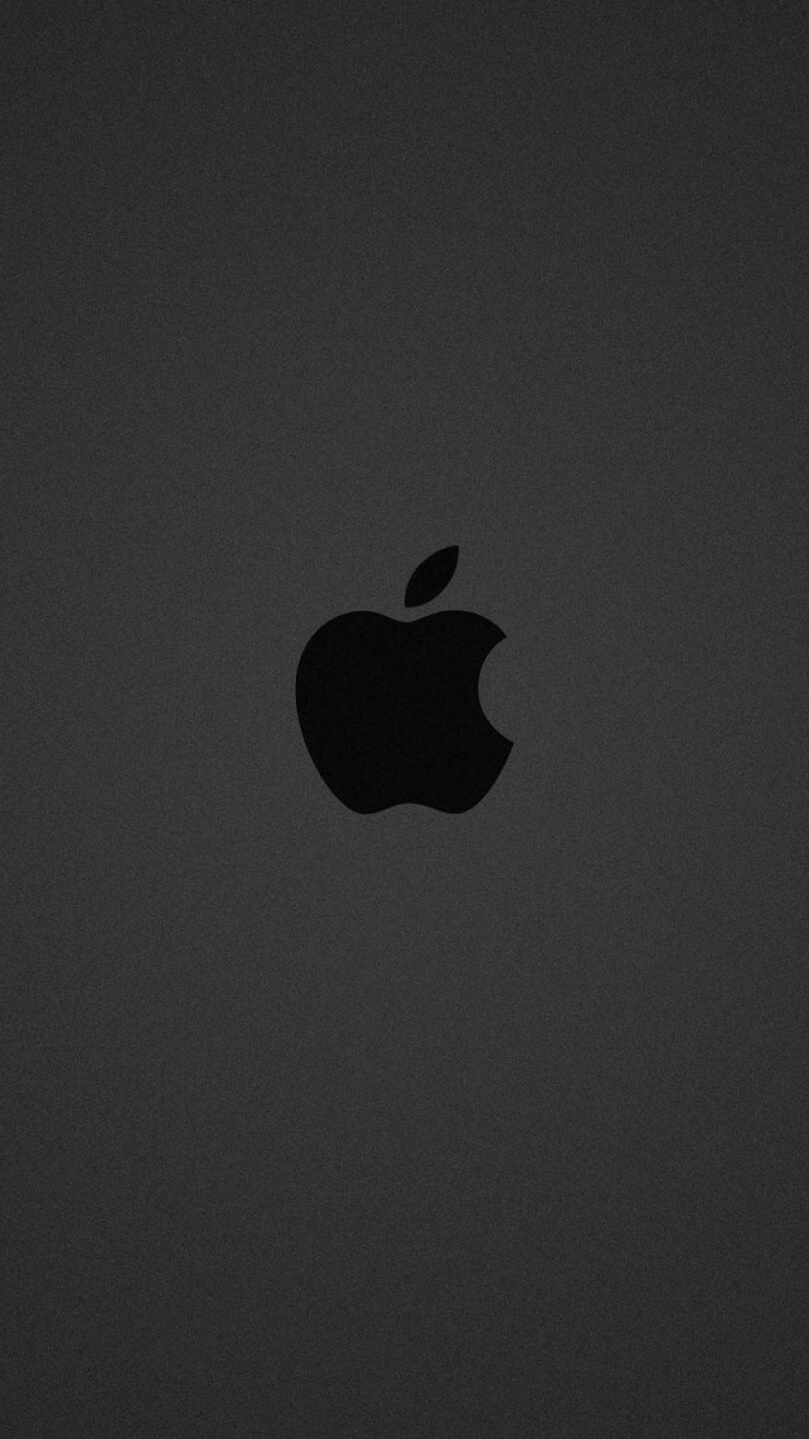 Ein apple-logo auf einem dunklen hintergrund (apfel, schwarz, logo, graphiken, baum)