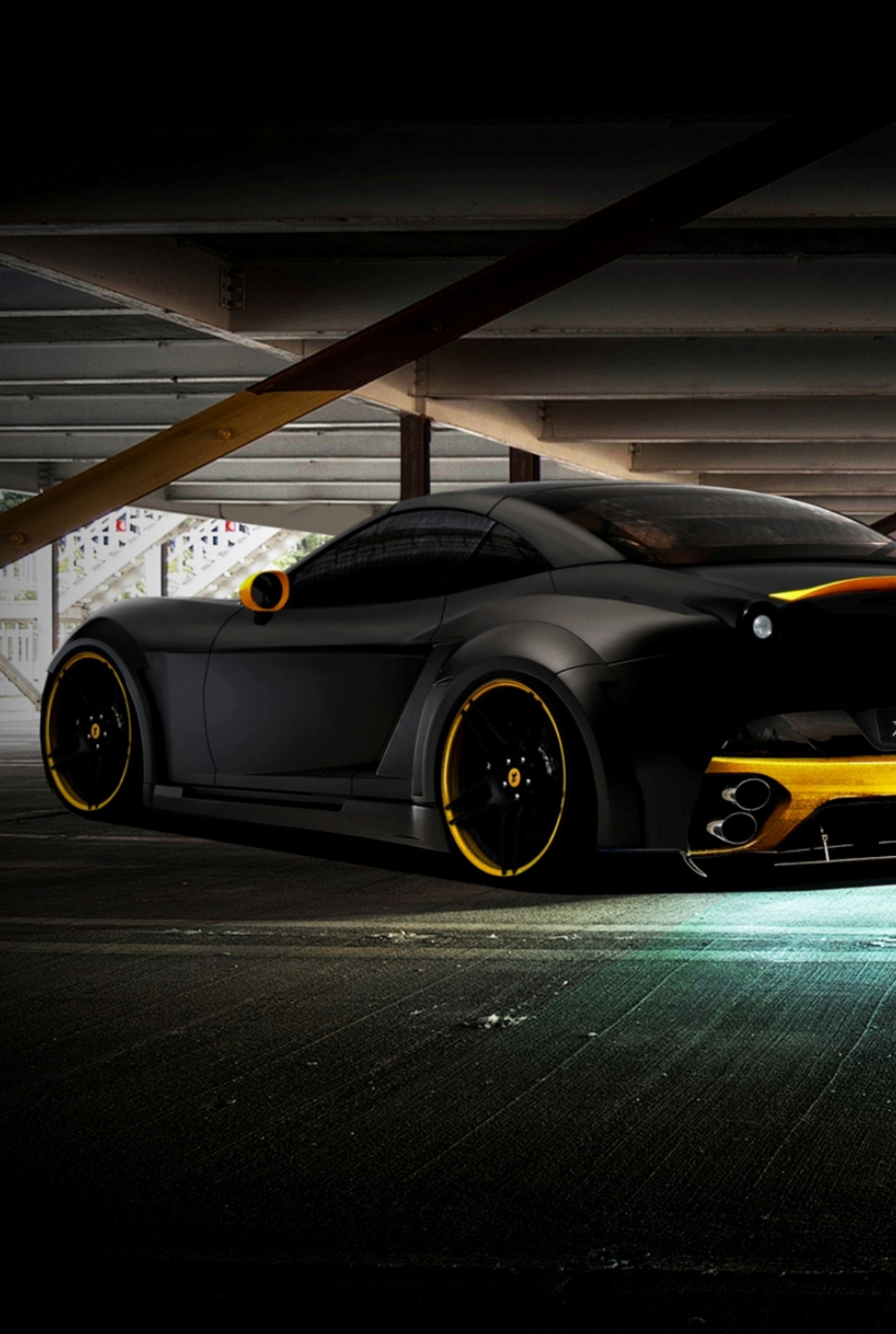 A close up of a black and yellow sports car in a parking garage (best, california, car, ferrari)