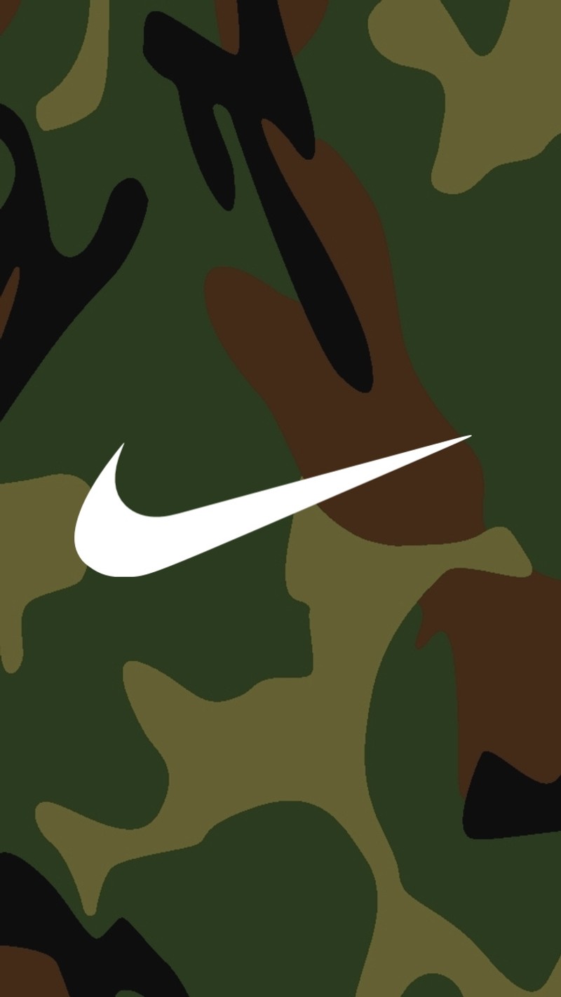 Un gros plan d'un papier peint camouflage avec un logo nike blanc (browns, football, lien, nike, quitter)