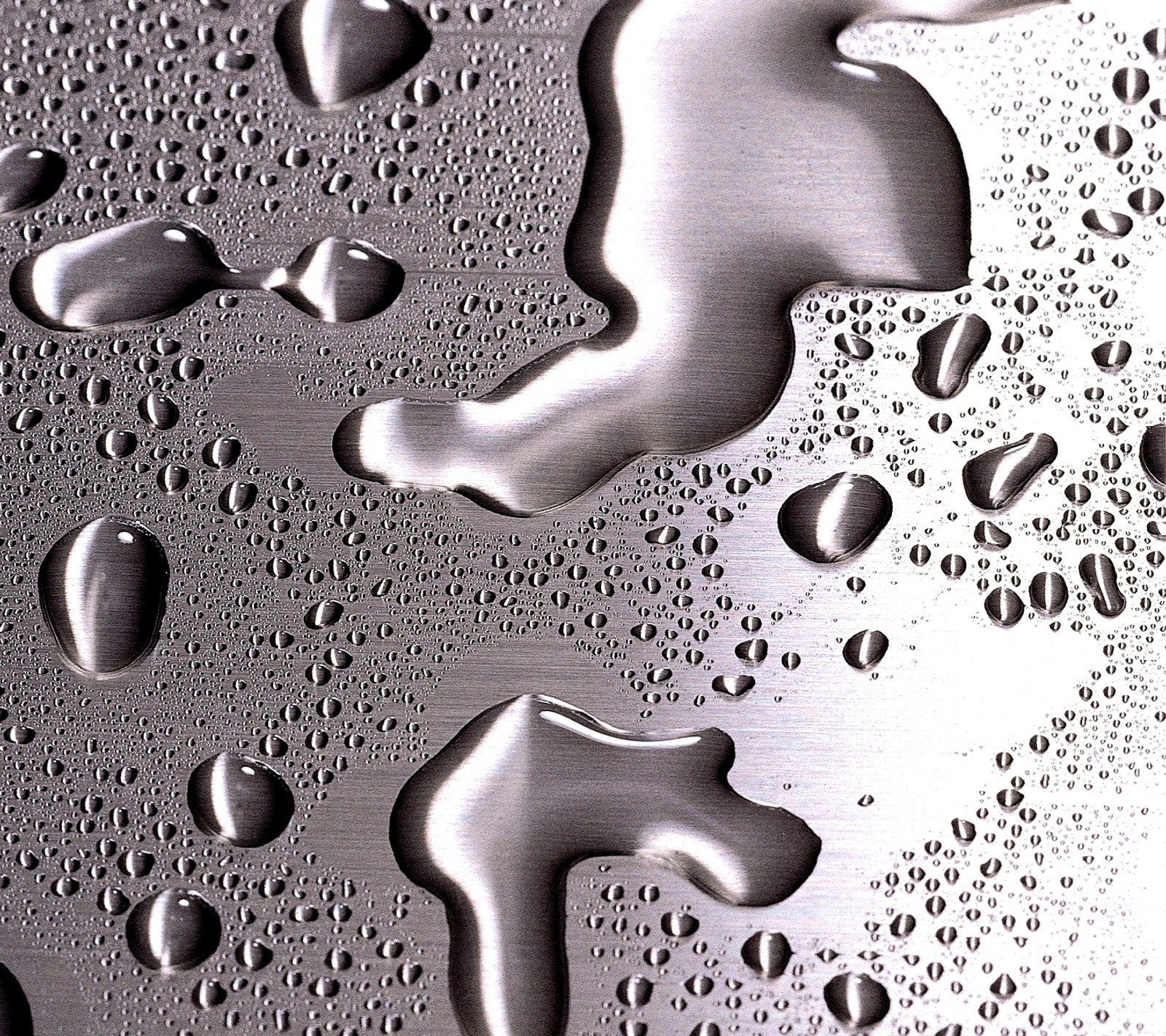 A close up of a metal surface with water droplets on it (2013, 3d, beauty, cool, hd)