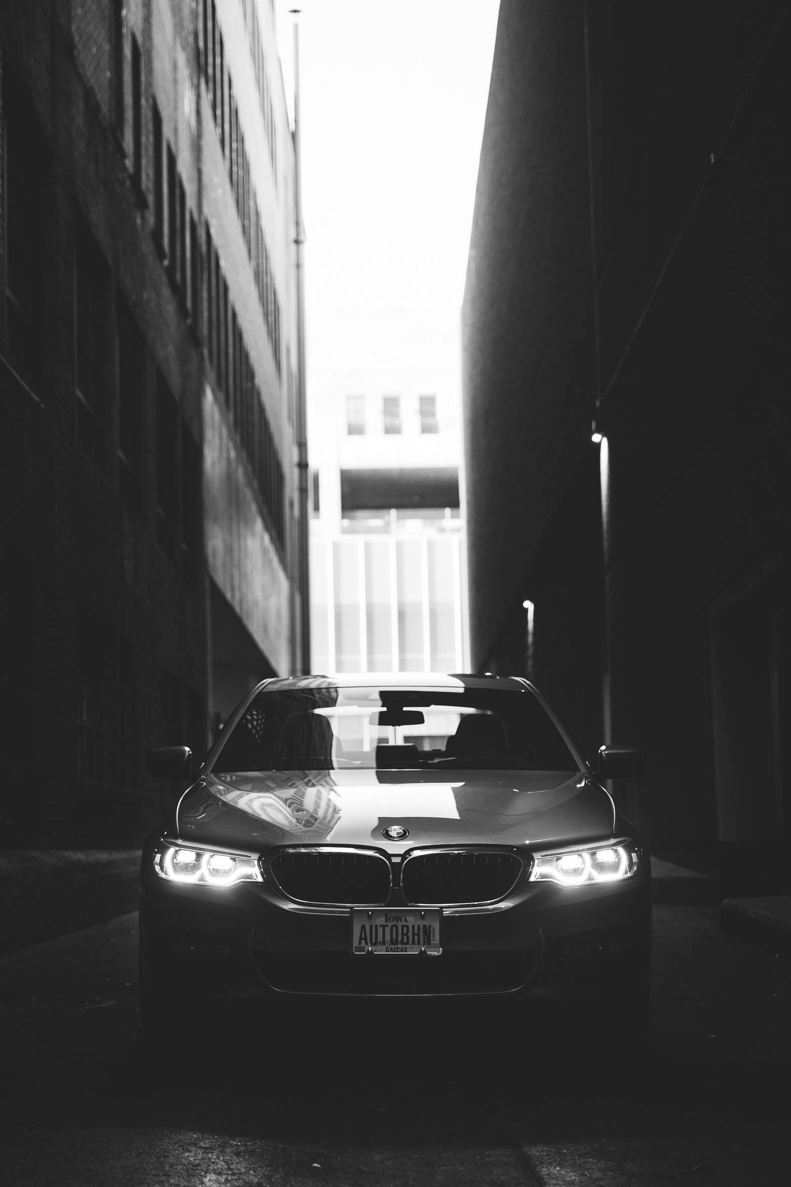 Arafed image of a car parked in a dark alley (car, sports car, bmw 5 series, bmw m4, white)