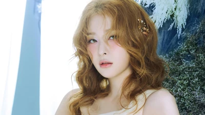 Seulgi de Red Velvet rayonne d'une beauté éthérée dans un cadre serein inspiré du cosmos.