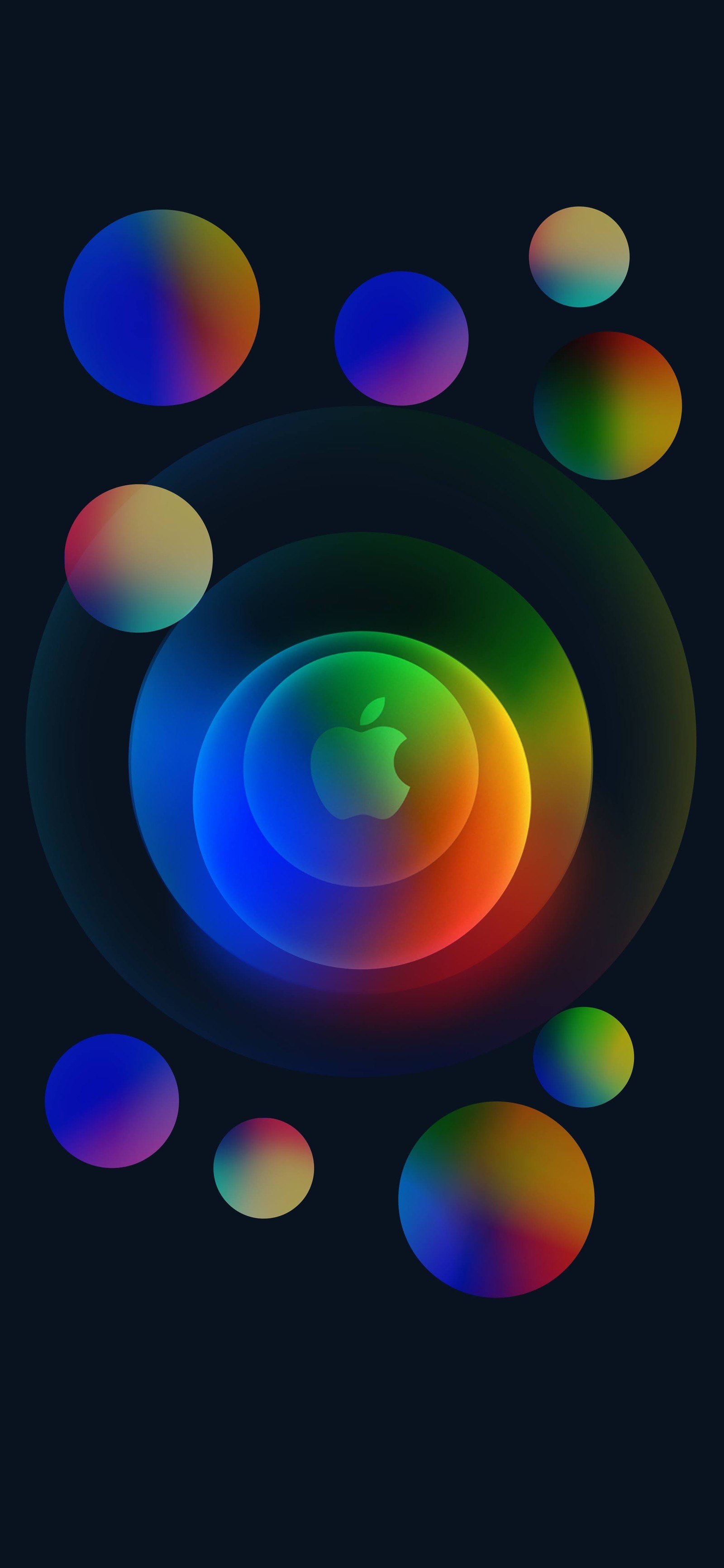 Un gros plan d'un objet circulaire coloré avec de nombreux cercles (pomme, iphone, pommes, ios, android)