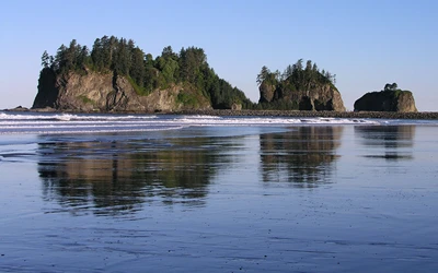 Serene Coastal Islands Reflected on Tranquil Shoreline