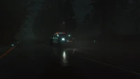 Midnight Encounter: The Crew's Police Car on a Rainy Asphalt Road