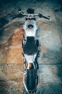 Sleek Motorcycle from Above on Concrete Surface