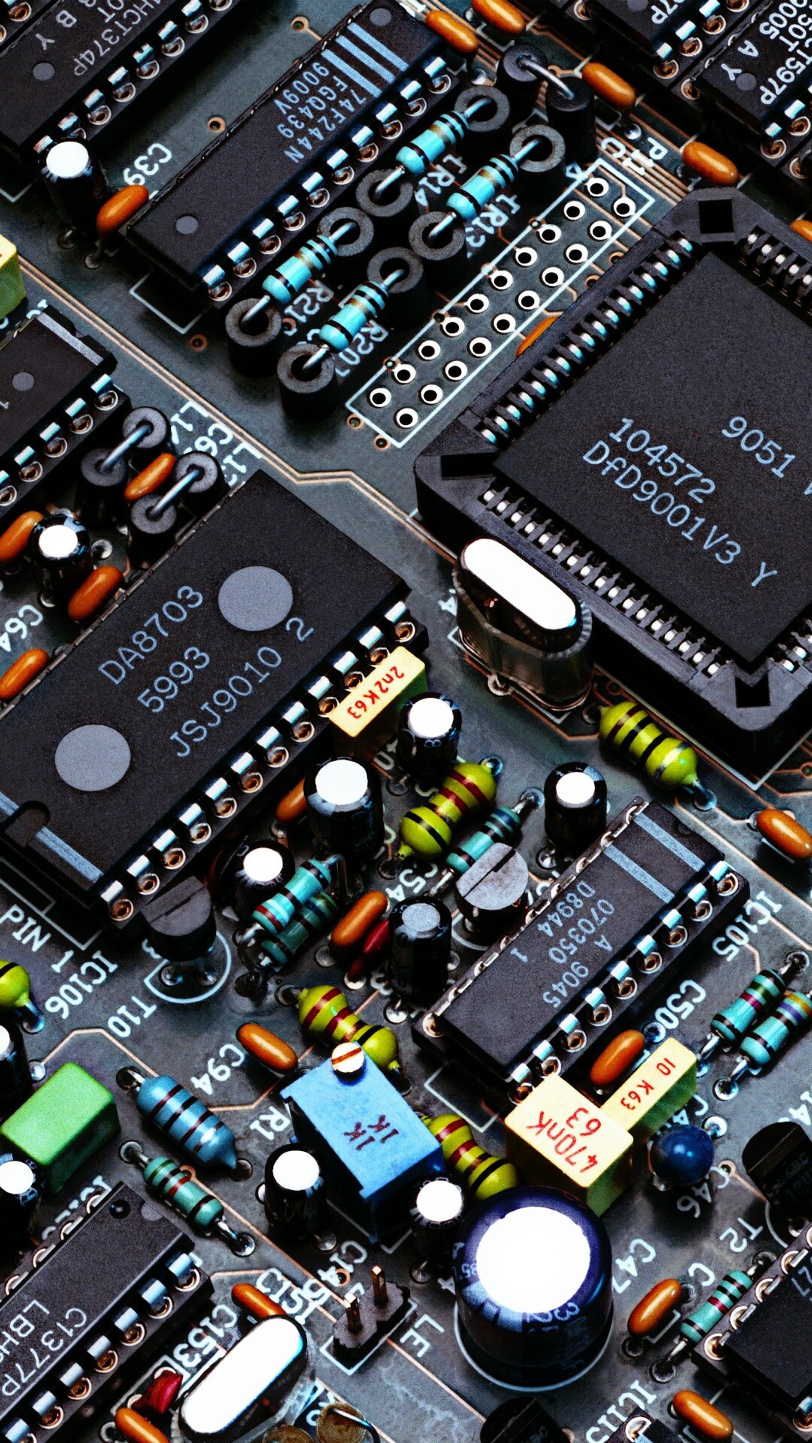 A close up of a computer board with many electronic components (board, circuit, city, effects, electronic)