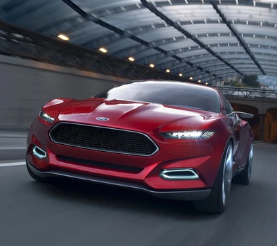 Elegante coche rojo Ford en movimiento dentro de un túnel