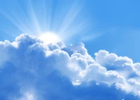 Sunlit Cumulus Clouds Beneath a Tranquil Blue Sky