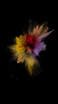 Explosion vibrante de couleur sur un fond sombre