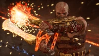 Kratos wielding the Blades of Chaos in God of War Ragnarök, ready for battle.