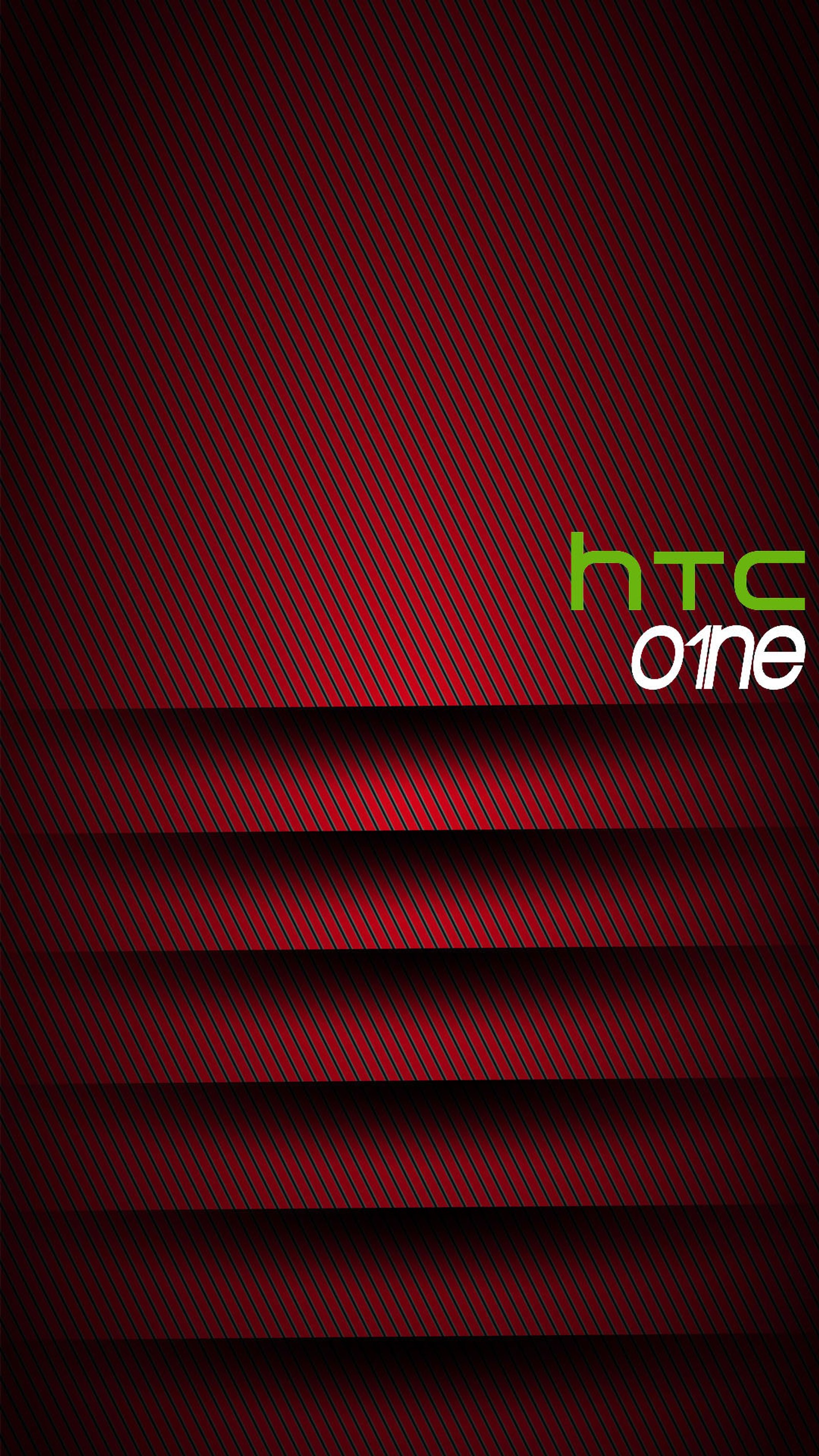 Um close de uma parede vermelha e preta com um logotipo verde da htc one (htc, htc one, um, vermelho, redone)