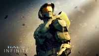 Master Chief dans une pose dynamique, mettant en valeur l'armure emblématique de Halo Infinite contre un arrière-plan atmosphérique.