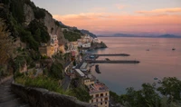 Amalfi Coast at Dusk: A Scenic Village Nestled Between Cliffs and Sea