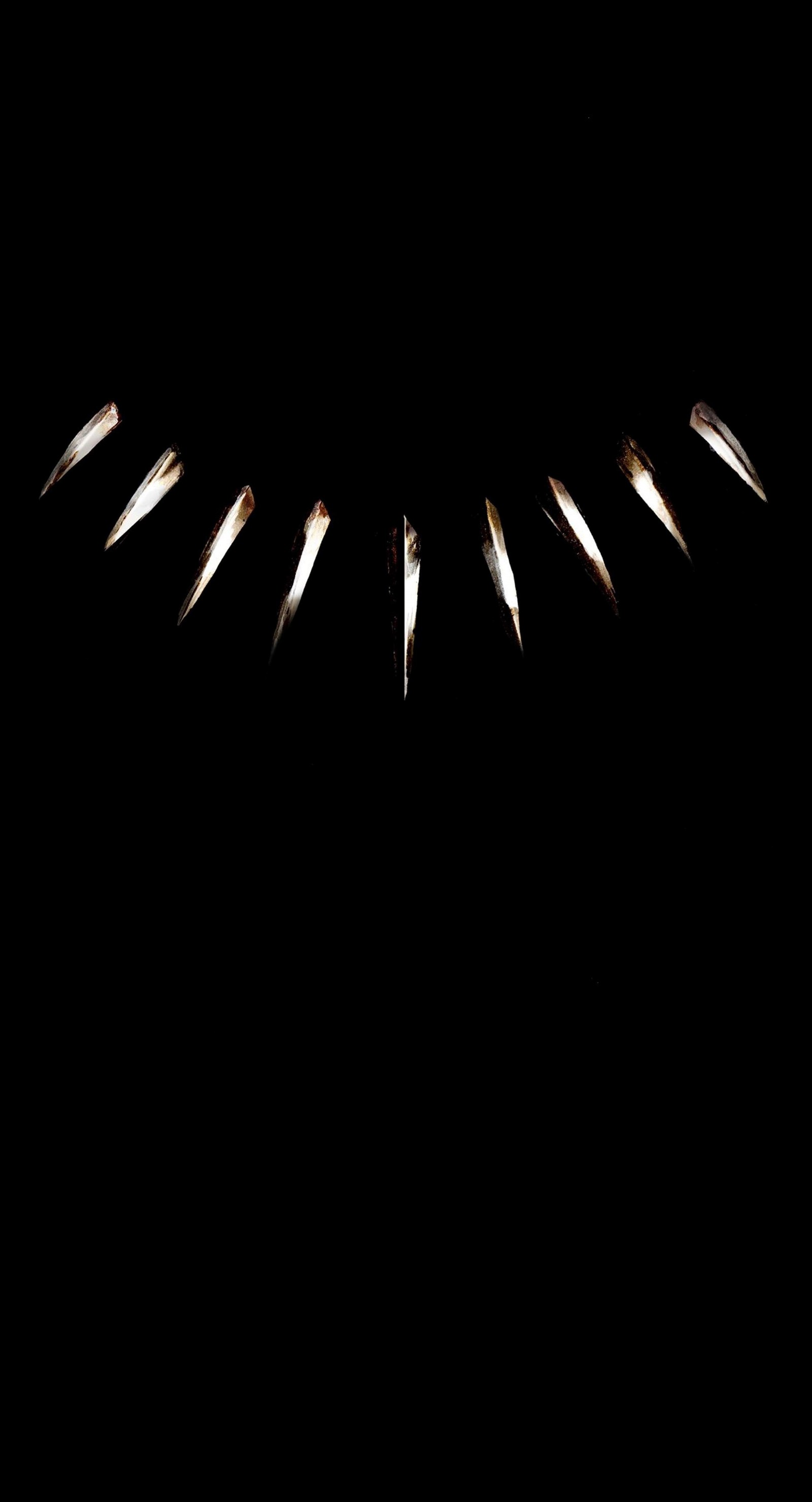 A close up of a black panther's face with sharp teeth (black p, black panther, marvel, panther, security)