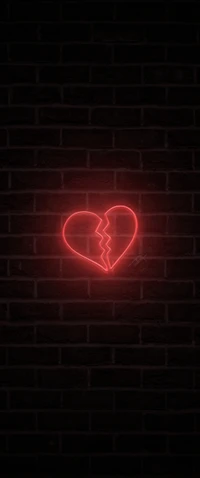 Broken Red Heart Neon Glow on Dark Wall