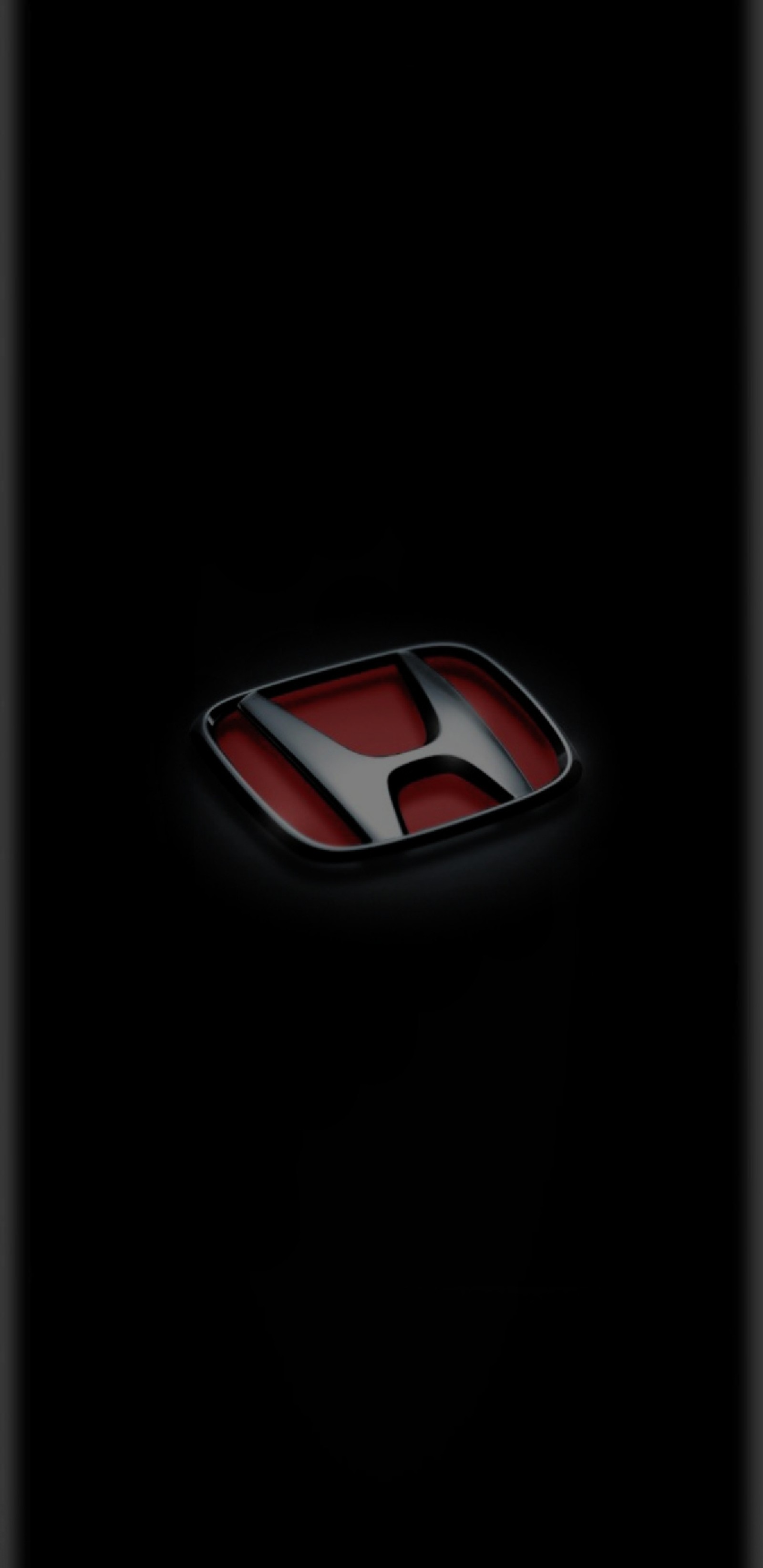 Primer plano de un logo de honda sobre un fondo negro (negro, logotipo de coche, borde, edge sides, brillante)